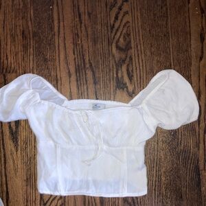 White hollister short sleeve off the shoulder top xs . New with tags.never worn